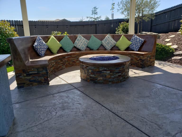 outdoor seating area with firepit installed in backyard