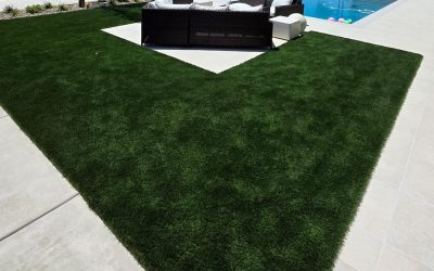 artificial grass installed in backyard with pool