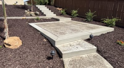 backyard landscaping with concrete work
